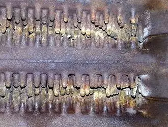 przegląd pieca De Dietrich - wymiennik kotła żeliwnego po czyszczeniu mechanicznym